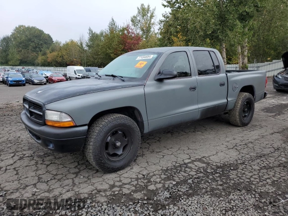 2003 Dodge Dakota Sport with VIN 1D7HL38N63S192308, listed as a Copart auction lot 77494684 with 128,512 mi miles and Salvage Title. Bid and sale history available at carsss.com. Image 1.