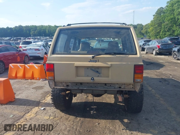 1995 Jeep Cherokee Sport with VIN 1J4FJ68S3SL555908, listed as a IAAI auction lot 42222016 with 283,444 mi miles and . Bid and sale history available at DreamBid. Image 16.