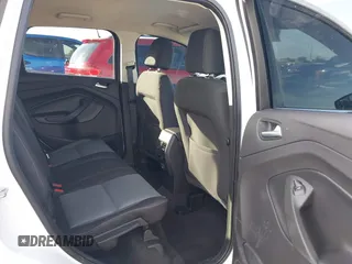 2017 Ford Escape SE z VIN 1FMCU0GD4HUC98899, wystawiony jako IAAI lot #41633762 z przebiegiem 72 245 mil mil oraz . Historia ofert i sprzedaży dostępna na DreamBid. Obrazek 8.