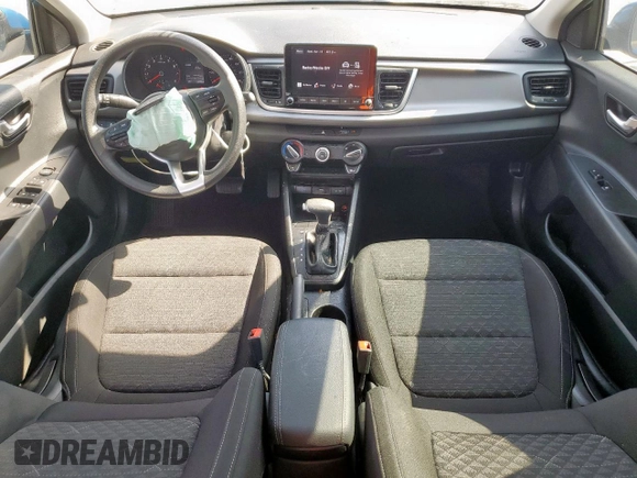 2023 Kia Rio LX z VIN 3KPA24AD2PE597810, wystawiony jako Copart lot #53565235 z przebiegiem 6 836 mil mil oraz Szkoda całkowita • Salvage title. Historia ofert i sprzedaży dostępna na DreamBid. Obrazek 8.