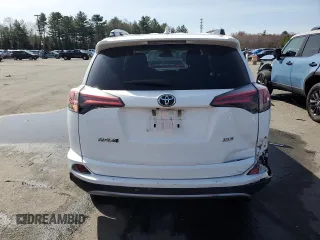 2018 Toyota RAV4 XLE with VIN 2T3WFREV4JW476959, listed as a Copart auction lot 51593265 with 198,596 mi miles and Salvage Title. Bid and sale history available at DreamBid. Image 6.