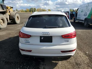 2015 Audi Q3 with VIN WA1EFEFS5FR009981, listed as a Copart auction lot 73714854 with 157,693 mi miles and Salvage title. Bid and sale history available at DreamBid. Image 6.
