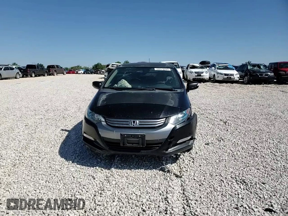 2010 Honda Insight EX z VIN JHMZE2H72AS009647, wystawiony jako Copart lot #60079205 z przebiegiem 157 844 mil mil oraz Czysty tytuł • Clean title. Historia ofert i sprzedaży dostępna na DreamBid. Obrazek 13.