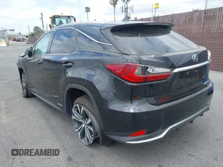 2022 Lexus RX with VIN 2T2HGMDA1NC090258, listed as a IAAI auction lot 36253855 with 8,565 mi miles. Bid and sale history available at carsss.com. Image 3.