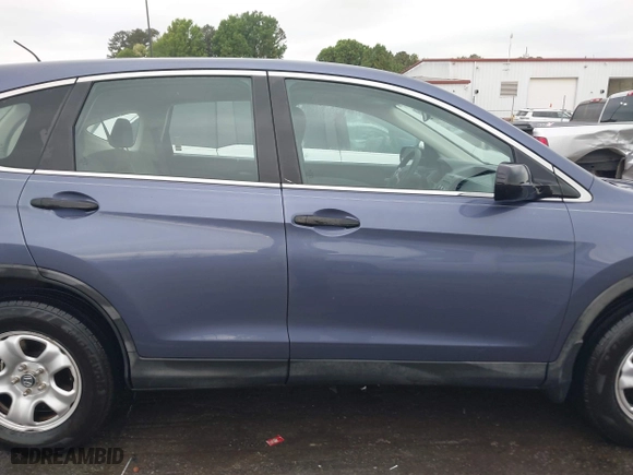 2014 Honda CR-V LX with VIN 3CZRM3H39EG703959, listed as a IAAI auction lot 41990964 with 87,424 mi miles. Bid and sale history available at carsss.com. Image 13.