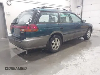 1998 Subaru Legacy Outback with VIN 4S3BG6855W7648585, listed as a IAAI auction lot 41295413 with 110,279 mi miles and . Bid and sale history available at DreamBid. Image 4.