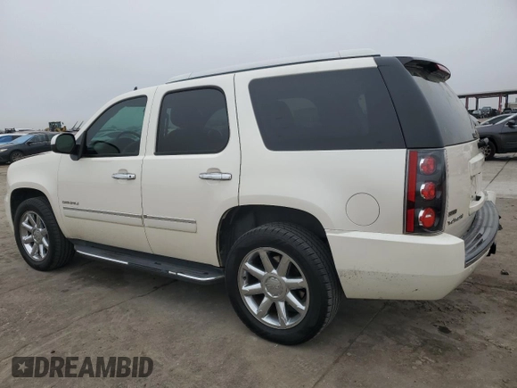 2012 GMC Yukon Denali with VIN 1GKS1EEF9CR286600, listed as a Copart auction lot 44409805 with 140,156 mi miles and Salvage Title. Bid and sale history available at carsss.com. Image 2.