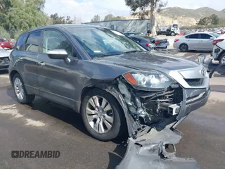 2012 Acura RDX Tech Pkg with VIN 5J8TB2H58CA002131, listed as a IAAI auction lot 41880892 with 140,115 mi miles. Bid and sale history available at carsss.com. Image 1.