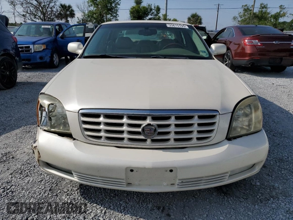 2003 Cadillac DeVille DTS z VIN 1G6KF57933U147843, wystawiony jako Copart lot #55875195 z przebiegiem 160 814 mil mil oraz Szkody całkowita. Historia ofert i sprzedaży dostępna na DreamBid. Obrazek 5.