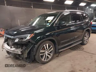 2016 Honda Pilot Touring with VIN 5FNYF6H98GB035226, listed as a IAAI auction lot 42022957 with 103,842 mi miles and . Bid and sale history available at DreamBid. Image 18.