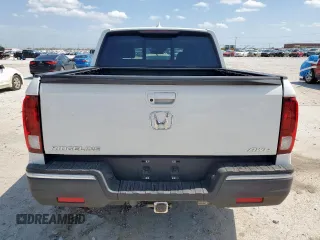 2020 Honda Ridgeline RTL with VIN 5FPYK3F57LB031244, listed as a Copart auction lot 58863795 with 54,318 mi miles and Salvage title. Bid and sale history available at DreamBid. Image 6.