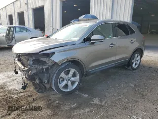 2017 Lincoln MKC Premiere z VIN 5LMCJ1C95HUL16078, wystawiony jako Copart lot #55853005 z przebiegiem 114 821 mil mil oraz Szkoda całkowita • Salvage title. Historia ofert i sprzedaży dostępna na DreamBid. Obrazek 1.