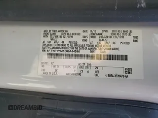 2016 Ford Transit Cargo z VIN 1FTYE1YM1GKA44590, wystawiony jako Copart lot #53102675 z przebiegiem 179 687 mil mil oraz Szkoda całkowita • Salvage title. Historia ofert i sprzedaży dostępna na DreamBid. Obrazek 13.