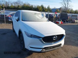 2017 Mazda CX-5 Touring with VIN JM3KFBCL8H0136601, listed as a IAAI auction lot 41830355 with 113,677 mi miles. Bid and sale history available at carsss.com. Image 6.