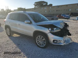 2014 Volkswagen Tiguan SE z VIN WVGAV3AX6EW549608, wystawiony jako Copart lot #48240405 z przebiegiem 81 629 mil mil oraz Szkoda całkowita • Salvage title. Historia ofert i sprzedaży dostępna na DreamBid. Obrazek 4.