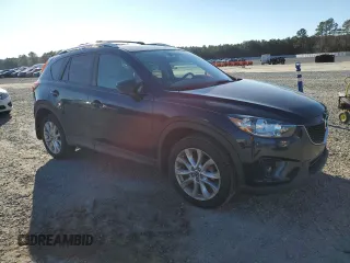 2014 Mazda CX-5 Grand Touring with VIN JM3KE4DY1E0405493, listed as a Copart auction lot 41688915 with 94,970 mi miles and Salvage Title. Bid and sale history available at carsss.com. Image 4.