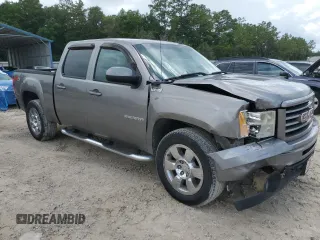 2013 GMC Sierra 1500 SLT with VIN 3GTP2WE25DG134770, listed as a Copart auction lot 59616535 with 212,304 mi miles and Salvage title. Bid and sale history available at DreamBid. Image 4.