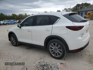 2021 Mazda CX-5 Grand Touring Reserve with VIN JM3KFBAY5M0320404, listed as a Copart auction lot 50405075 with 32,596 mi miles and Salvage Title. Bid and sale history available at carsss.com. Image 2.