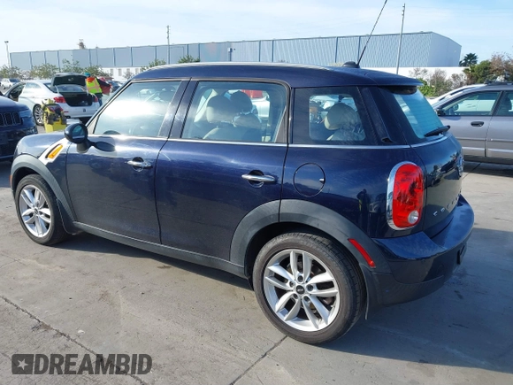 2014 MINI Countryman with VIN WMWZB3C50EWR42268, listed as a IAAI auction lot 41845750 with 117,192 mi miles and . Bid and sale history available at DreamBid. Image 3.