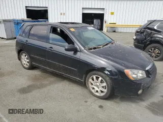 2005 Kia Spectra with VIN KNAFE162655074198, listed as a Copart auction lot 71015104 with 200,819 mi miles and Salvage Title. Bid and sale history available at DreamBid. Image 4.
