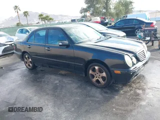 2002 Mercedes-Benz E-Class AWD with VIN WDBJF83J32X075094, listed as a IAAI auction lot 41788205 with 195,323 mi miles. Bid and sale history available at carsss.com. Image 1.