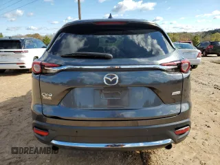 2017 Mazda CX-9 Grand Touring z VIN JM3TCADY8H0138866, wystawiony jako Copart lot #80894184 z przebiegiem Nie podano mil oraz Szkoda całkowita • Salvage title. Historia ofert i sprzedaży dostępna na DreamBid. Obrazek 6.