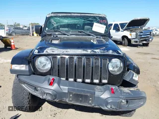 2018 Jeep Wrangler Unlimited Rubicon with VIN 1C4HJXFGXJW255881, listed as a IAAI auction lot 42316499 with 39,439 mi miles and . Bid and sale history available at DreamBid. Image 13.