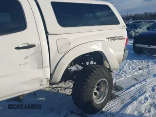 2014 Toyota Tacoma with VIN 3TMLU4EN0EM147193, listed as a IAAI auction lot 41280636 with 162,345 mi miles. Bid and sale history available at carsss.com. Image 6.