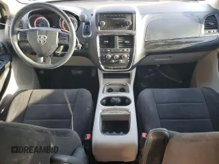 2014 Dodge Grand Caravan SXT with VIN 2C4RDGCG1ER121033, listed as a Copart auction lot 52030715 with 105,451 mi miles and Salvage Title. Bid and sale history available at DreamBid. Image 8.