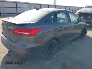 2016 Ford Focus SE with VIN 1FADP3F2XGL317130, listed as a IAAI auction lot 41970029 with 85,241 mi miles and . Bid and sale history available at DreamBid. Image 4.