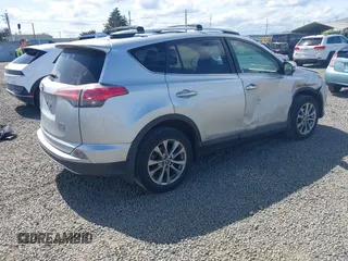 2016 Toyota RAV4 Limited with VIN JTMDJREVXGD030438, listed as a IAAI auction lot 42189476 with 106,366 mi miles and . Bid and sale history available at DreamBid. Image 4.
