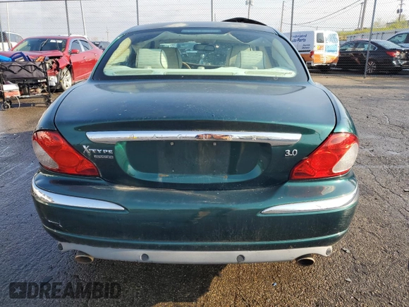 2007 Jaguar X-Type z VIN SAJWA51A17WJ20376, wystawiony jako Copart lot #52513655 z przebiegiem 162 104 mil mil oraz Tytuł czysty. Historia ofert i sprzedaży dostępna na DreamBid. Obrazek 6.