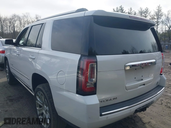 2016 GMC Yukon Denali with VIN 1GKS2CKJ9GR334645, listed as a IAAI auction lot 41781040 with 141,405 mi miles. Bid and sale history available at carsss.com. Image 3.