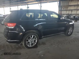 2014 Jeep Grand Cherokee с VIN 1C4RJEJM8EC424373, выставлен на аукционе Copart как лот 72256674 с пробегом 128 998 миль миль и Списание • Salvage title. История ставок и продаж доступна на DreamBid. Изображение 3.