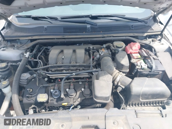 2013 Ford Taurus Limited with VIN 1FAHP2F87DG235392, listed as a IAAI auction lot 42700160 with 123,904 mi miles and . Bid and sale history available at DreamBid. Image 10.