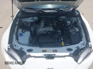 2021 Mazda MX-5 Miata Grand Touring z VIN JM1NDAM71M0457011, wystawiony jako IAAI lot #42427652 z przebiegiem 4 045 mil mil oraz . Historia ofert i sprzedaży dostępna na DreamBid. Obrazek 10.