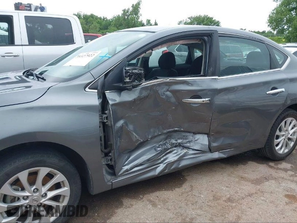 2019 Nissan Sentra S with VIN 3N1AB7AP9KY415350, listed as a IAAI auction lot 41059859 with 51,416 mi miles and . Bid and sale history available at DreamBid. Image 6.