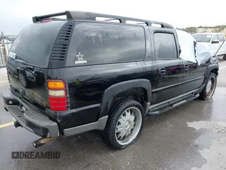 2002 Chevrolet Suburban LT with VIN 3GNFK16Z72G165792, listed as a IAAI auction lot 41921486 with 237,675 mi miles. Bid and sale history available at carsss.com. Image 4.