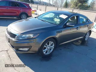 2013 Kia Optima LX with VIN 5XXGM4A74DG114626, listed as a IAAI auction lot 41349903 with 126,856 mi miles. Bid and sale history available at carsss.com. Image 2.