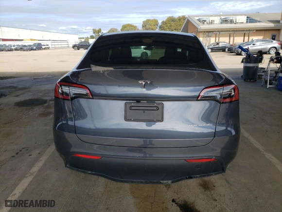 2023 Tesla Model Y Long Range with VIN 7SAYGDEEXPA137582, listed as a Copart auction lot 46869265 with 16,474 mi miles and Salvage Title. Bid and sale history available at carsss.com. Image 6.