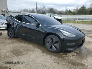 2019 Tesla Model 3 Mid Range z VIN 5YJ3E1EA8KF297299, wystawiony jako Copart lot #47935394 z przebiegiem 117 644 mil mil oraz Szkoda całkowita • Salvage title. Historia ofert i sprzedaży dostępna na DreamBid. Obrazek 4.