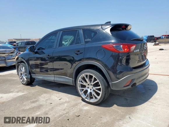2014 Mazda CX-5 Touring with VIN JM3KE2CY5E0316077, listed as a Copart auction lot 58218735 with 190,789 mi miles and Salvage title. Bid and sale history available at DreamBid. Image 2.