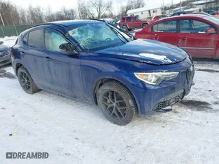 2021 Alfa Romeo Stelvio Ti with VIN ZASPAKBN1M7D09433, listed as a IAAI auction lot 41378468 with 31,717 mi miles. Bid and sale history available at carsss.com. Image 1.