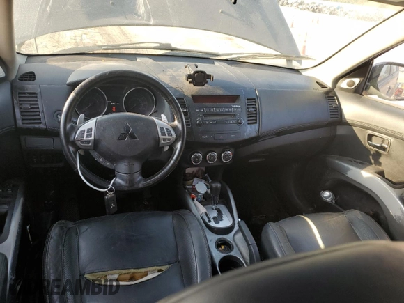2010 Mitsubishi Outlander XLS z VIN JA4JS4AX2AZ014751, wystawiony jako Copart lot #72210974 z przebiegiem 183 864 mil mil oraz Szkoda całkowita • Salvage title. Historia ofert i sprzedaży dostępna na DreamBid. Obrazek 8.