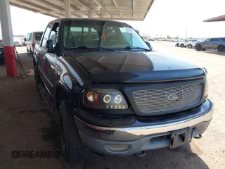 2001 Ford F-150 XLT z VIN 1FTRW08L41KE49398, wystawiony jako IAAI lot #42473397 z przebiegiem Nie podano mil oraz . Historia ofert i sprzedaży dostępna na DreamBid. Obrazek 1.