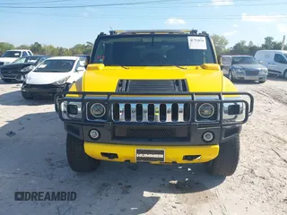 2003 Hummer H2 with VIN 5GRGN23U93H108017, listed as a IAAI auction lot 41793034 with 203,739 mi miles. Bid and sale history available at carsss.com. Image 12.