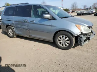 2010 Honda Odyssey EX-L with VIN 5FNRL3H69AB108144, listed as a Copart auction lot 48874205 with 56,609 mi miles and Salvage Title. Bid and sale history available at carsss.com. Image 4.