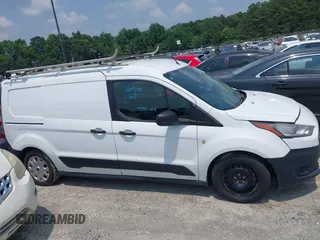 2020 Ford Transit Connect XL z VIN NM0LS7E27L1465767, wystawiony jako IAAI lot #42273676 z przebiegiem 147 820 mil mil oraz . Historia ofert i sprzedaży dostępna na DreamBid. Obrazek 13.