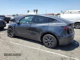 2024 Tesla Model Y с VIN 7SAYGDED5RF177307, выставлен на аукционе Copart как лот 57170315 с пробегом 14 726 миль миль и Списание • Salvage title. История ставок и продаж доступна на DreamBid. Изображение 2.