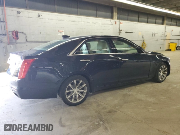 2016 Cadillac CTS Luxury Collection AWD with VIN 1G6AX5SS6G0126033, listed as a Copart auction lot 55636615 with 76,113 mi miles and Salvage title. Bid and sale history available at DreamBid. Image 3.